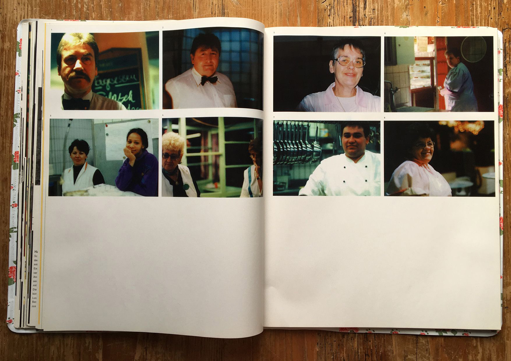 open raststatten book on wooden table with pictures of staff