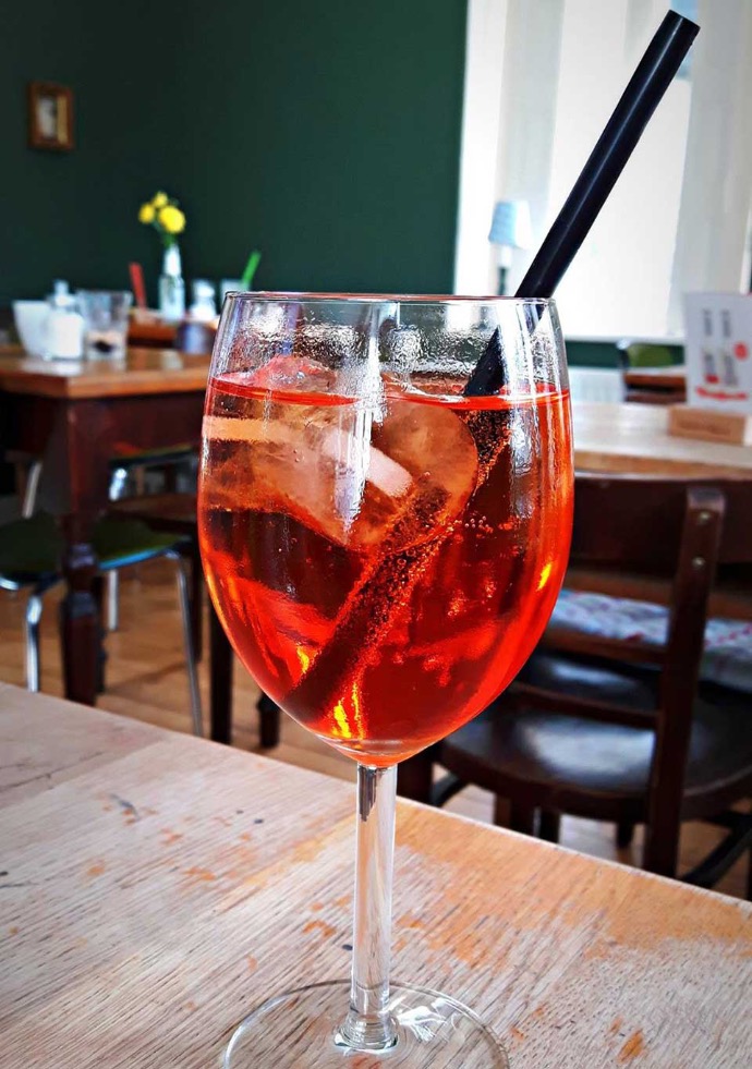 cafe room with aperol glass