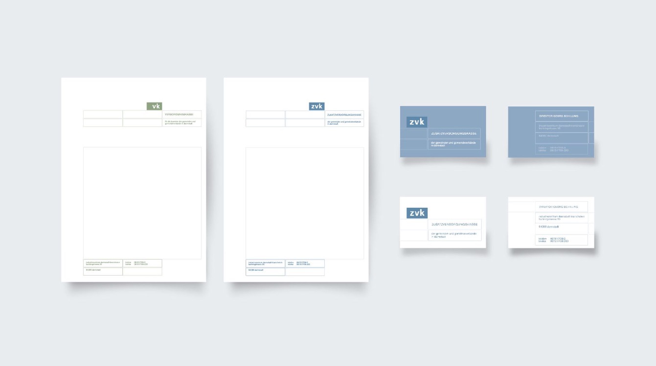 letterhead and business cards on gray background 